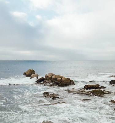 a rock formation in the ocean