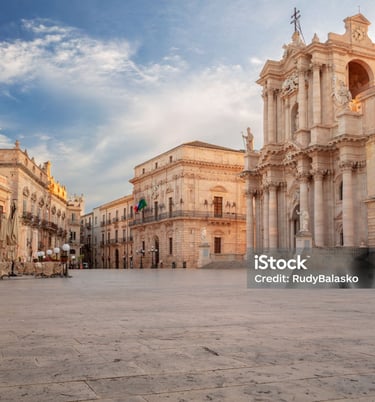 a large building with a clock tower in the middle of it