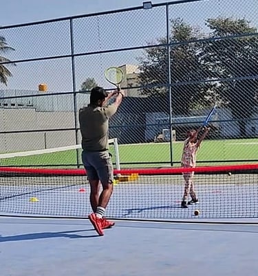 Coach Rohan working with Red ball player