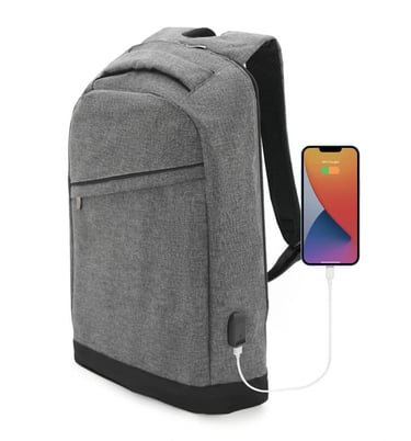 Gray slim laptop backpack with integrated USB charging port connected to a smartphone.