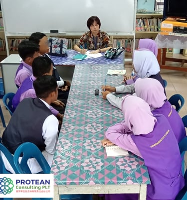 Protean Consulting moderating focus group discussion in school setting.