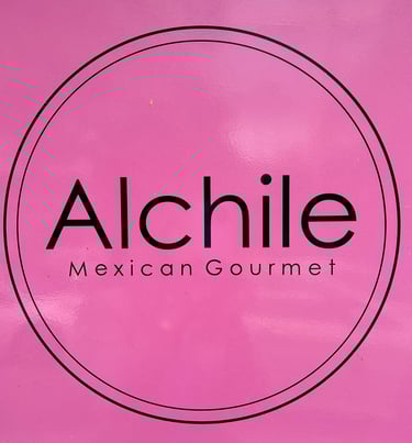 a pink box with Alchile Mexican Gourmet sign