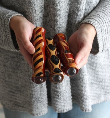 a person holding a pair of Teleidoscope with a zebra print