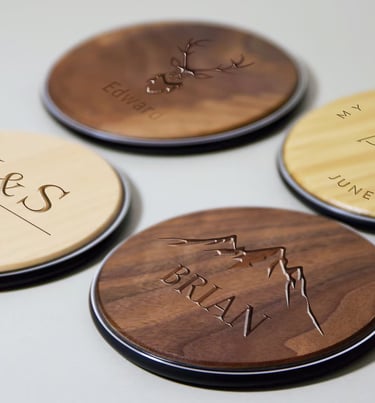 three wooden coasters with a wooden plaque on the top