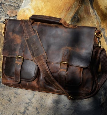 a brown leather briefcase bag with a brown leather briefcase