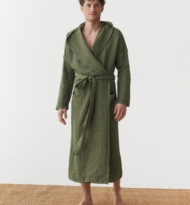 a man in a linen bathrober 