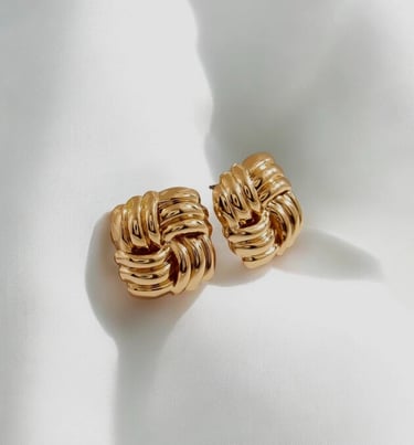 Shop choice of different styles of earring to match your outfit. 