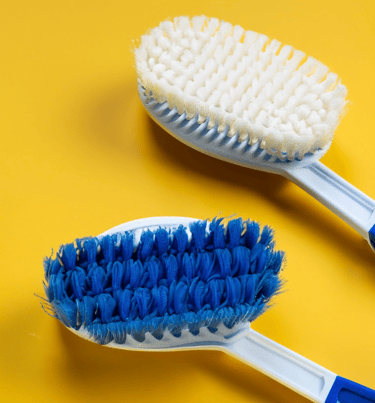 two brushes one blue and one white