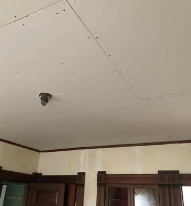 drywall ceiling with drywall just installed very nice job