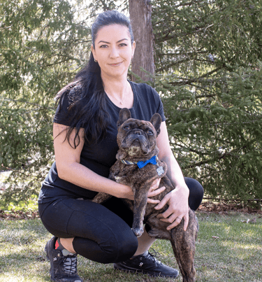 Business Manager Gwyn Dickie and her Frenchie Mugsy