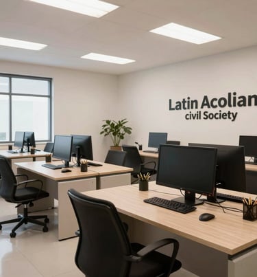 A professional interior photograph of a light-filled Latin American civil society organization office, featuring clean open-space desks and sleek technology.