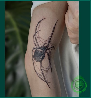 Realistic black widow spider tattoo with fine line details by a professional Da Nang tattoo shop