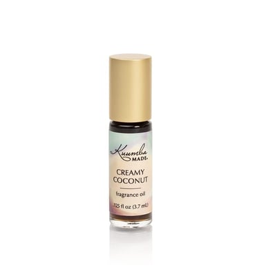 a bottle of creamy coconut oil with a gold cap
