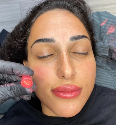 a woman with a lip blush and a black glove