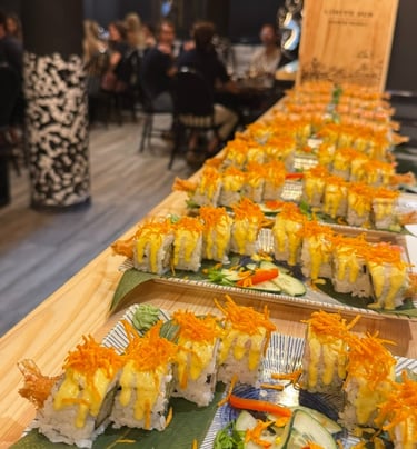 a long table with several different types of food
