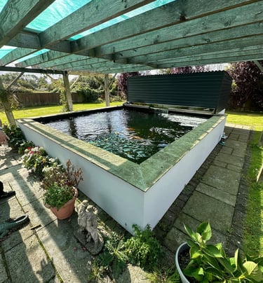 Raised block koi garden ponds