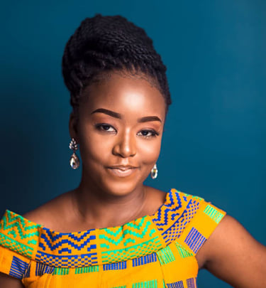 a woman in a yellow dress with a blue background