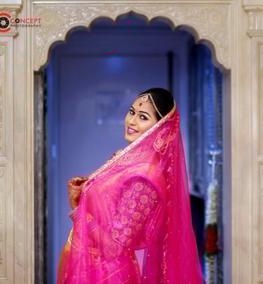 a woman in a pink sari, wedding photography