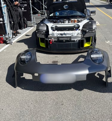 an Enlab Porsche car with a hood on it