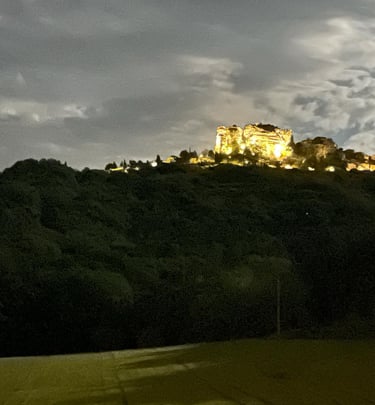 Saignon Rock illuminated at night