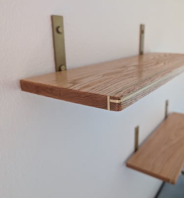 custom oak floating shelves with brass inlay for office