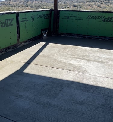 Balcony with poured concrete after being waterproofed.
