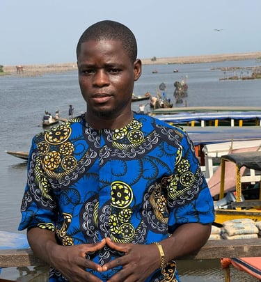Dahomey African Tours Senior Guide and Tour Planner at Ganvie Stilt Village in Benin