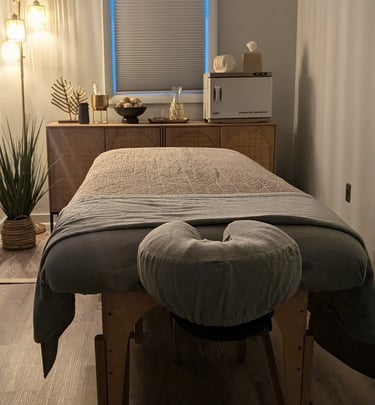 a massage table with a hot towel warmer