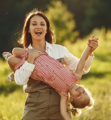 happy mom and child playing together