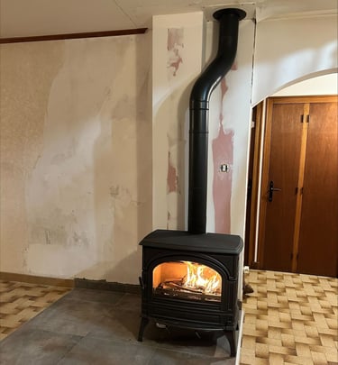 Installation de poêle à bois traditionnel