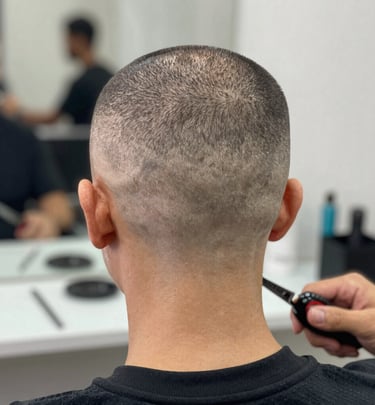 Happy client smiling after a combined haircut and beard grooming session