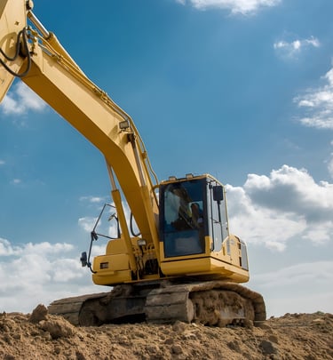 commercial sitework contractor excavator performing land clearing and grading Gulf South
