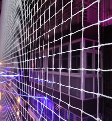 Close-up of durable mesh material used for pigeon net installation highlighting craftsmanship