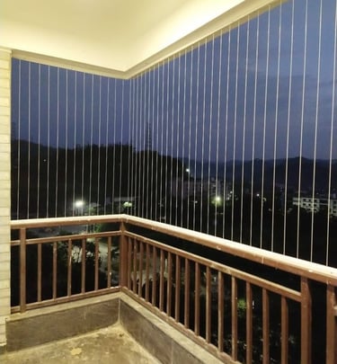 Close-up of sleek invisible grills seamlessly blending with a Kodambakkam balcony