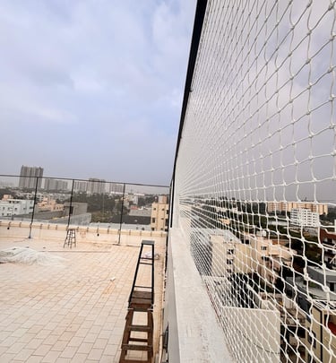 Close-up of a freshly installed durable sports net stretched tightly over a soccer goalpost on a sun