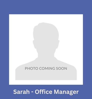 Portrait of Sarah, office manager, with the photo missing.