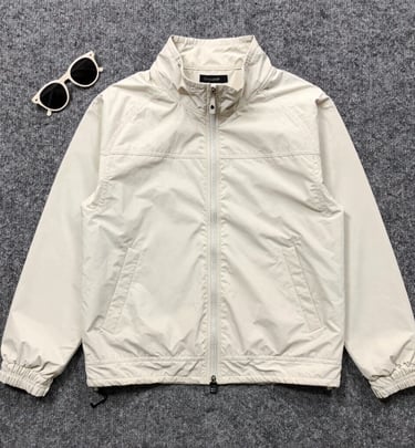 A casual outfit featuring a crew & co shirt and hat, styled for a relaxed weekend outing.