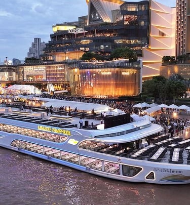 Bangkok dinner cruise experience along the river with illuminated city skyline at night