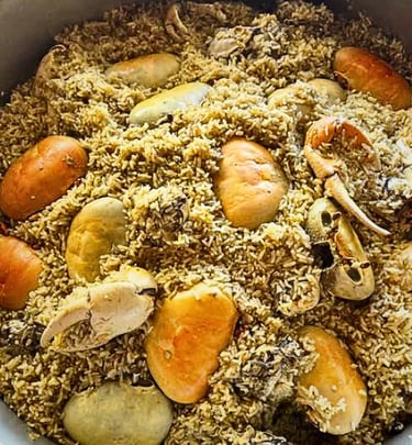 a potted rice dish with crabs, puerto rican arroz con jueyes