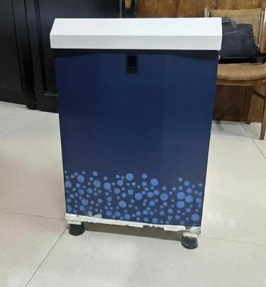 a blue and white box with blue dots on it