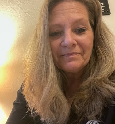 Wendy Stanfill CEO a woman with blonde hair and a black shirt