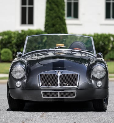 An image of a dark grey 1958 MG MGA Roadster