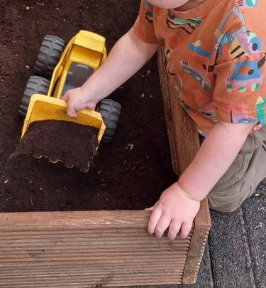 Mud play outside playground Montessori Playmates