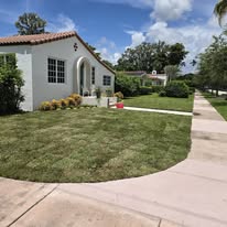 a house with a driveway and driveway with a driveway