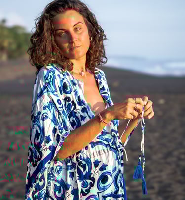a woman in a blue dress and a blue and white dress