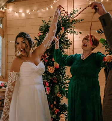 Independent celebrant leading a handfasting ceremony