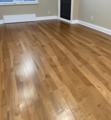 A beautifully refinished hardwood floor reflecting natural light.