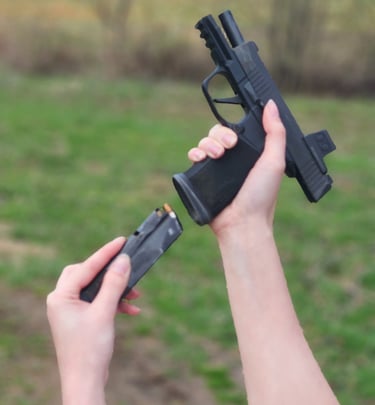Women reloading defensive firearm.