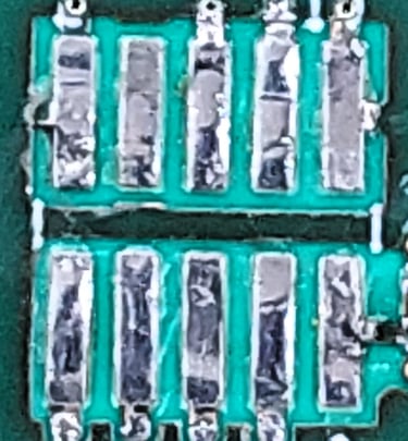 Connector with detached traces repair - traces back