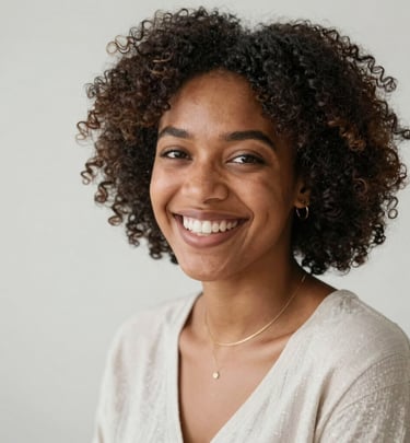 Close-up of an African woman enjoying a soothing facial treatment with a serene expression